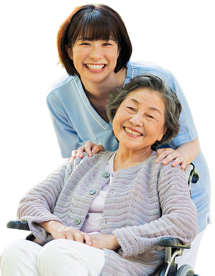 female caregiver and elderly smiling happily